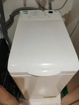 a white toilet with the lid down in a bathroom at Prestigia Marrakech Village Appartment in Marrakech