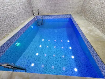 an overhead view of a swimming pool at Miramare Marrakech in Marrakech