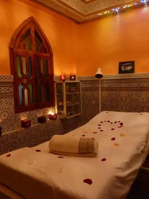 a bedroom with a bed with hearts on it at Riad Mahjouba Marrakech & SPA in Marrakech
