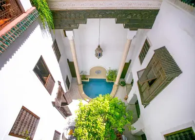 an overhead view of a pool in a building at Riad Marélia in Marrakech