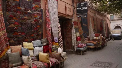 a street with a bunch of tables and chairs at Riad Ghali Hotel & SPA in Marrakech