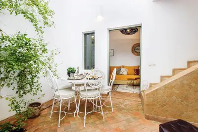 a dining room with a table and chairs at Riad Myla - 2mn de Jemaa El Fna in Marrakech