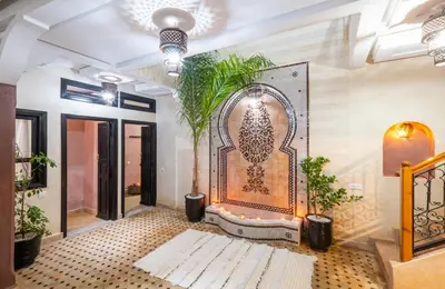 a room with a wall with a mandala on it at Riad Elite in Marrakech