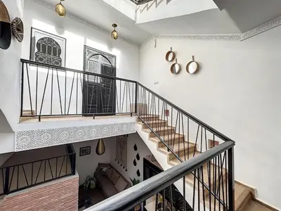an image of a staircase in a house at Riad Le Twenty 6 in Marrakech