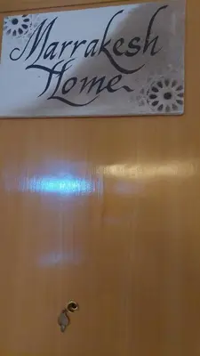 a sign on a bathroom door with the words maragogiss home at Marrakesh home in Marrakech