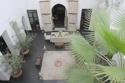 an overhead view of a living room with plants at Dar Seven in Marrakech