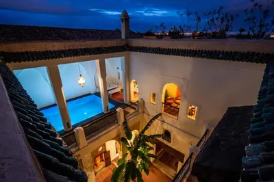 an overhead view of a house with a swimming pool at Riad Adilah Marrakech - by EMERALD STAY in Marrakech