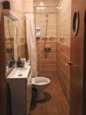 a bathroom with a toilet and a sink and a shower at Nice appartement à Marrakech in Marrakech