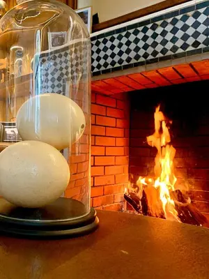 two eggs in a jar in front of a brick oven at Riad Dar Yasaman in Marrakech