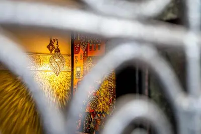 a view of a window through a metal fence at RIAD LA GAZELLE DU SUD in Marrakech
