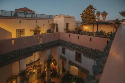 an aerial view of a building at night at Riad Les Hirondelles Boutique Hotel and Spa in Marrakech