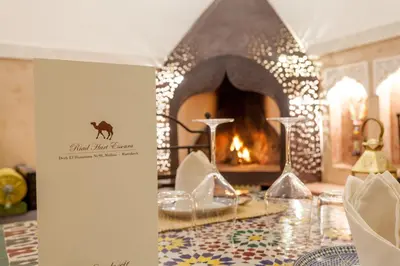 a sign for a kitchen with a fireplace at Riad Hart Essoura in Marrakech