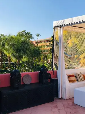 an outdoor wedding set up with a tent and a couch at riad anrich in Marrakech