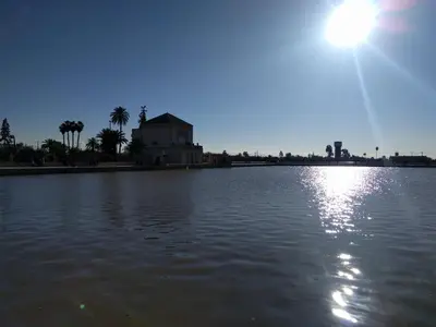 a large body of water with a building in the background at Opéra Appartement, Hivernage Marrakech. in Marrakech