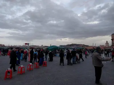 a large crowd of people standing around in a square at Opéra Appartement, Hivernage Marrakech. in Marrakech