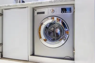 a washer and dryer in a room at Best for group, 5 min from medina in Marrakech