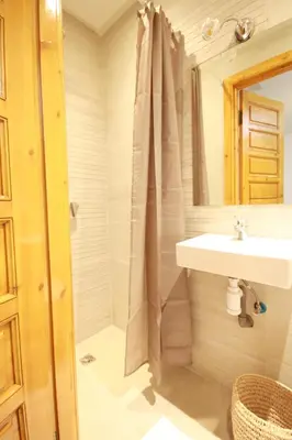 a bathroom with a sink and a shower at RIAD Miel & Une Nuit in Marrakech