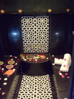 a room with a bench with candy on it at Riad et Spa Misria Les Oliviers in Marrakech