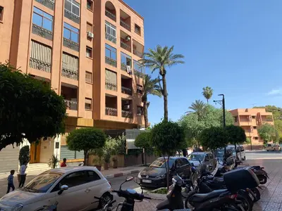 a row of motorcycles parked in front of a building at Comme à la maison, en plein coeur de Marrakech in Marrakech