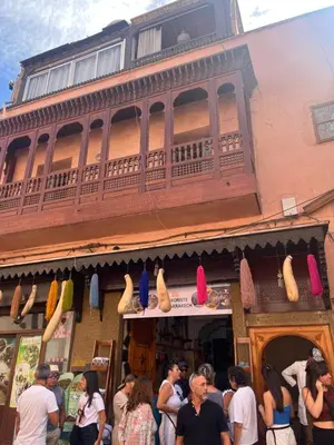 a group of people standing in front of a store at Dar Noubti in Marrakech