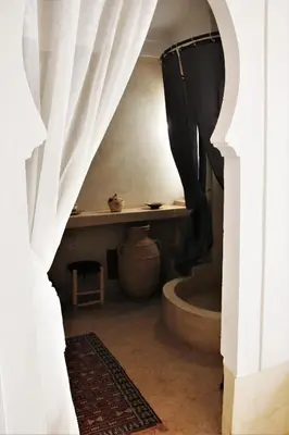 a view of a bathroom with a shower curtain at Riad El Ouarda in Marrakech