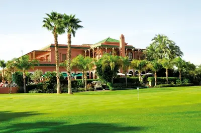 a view of the resort from the golf course at Palmeraie Golf Suites By Pickalbatros in Marrakech