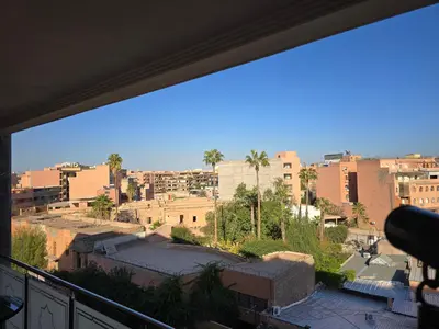 a view of a city from a balcony at Cosy Bagatelle Houses 1 & 2 in Marrakech
