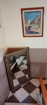 a mirror sitting on the floor in a room at DAR AZIZ in Marrakech