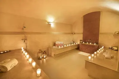a room with candles on the floor and a table at Kech Boutique Hotel in Marrakech