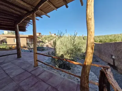 a view of a patio with a fence at Le Parc des Oliviers Ecolodge in Marrakech