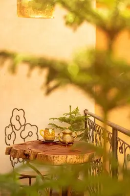 a table with two tea cups on top of it at Riad Persephone in Marrakech