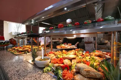 a buffet line with many different types of food at Valeria Madina Club - All Inclusive in Marrakech