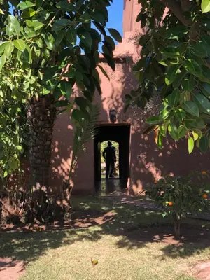 a person walking through a tunnel in a building at CASA ABRACADABRA in Marrakech