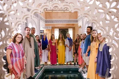 a group of people posing for a picture in a room at Riad Minami in Marrakech