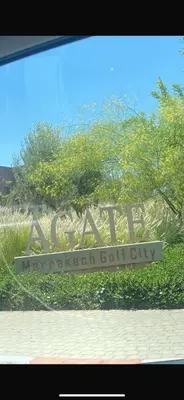 a sign for a marbella molecular golf city at Comme a la maison Prestigia Golf acces piscine in Marrakech