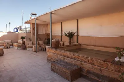 a swimming pool on the side of a building at Riad Agathe & Spa in Marrakech