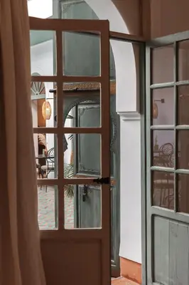 an open door with a view of a room at Riad Agathe & Spa in Marrakech