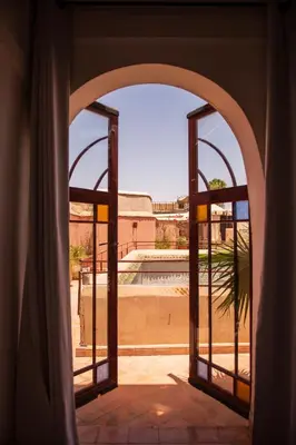 an open window with a view of a skate park at Riad Ben Youssef in Marrakech