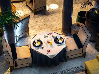an overhead view of a table with plates of food on it at Riad Houma in Marrakech