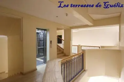 a large room with a staircase in a house at Les terrasses de Gueliz in Marrakech