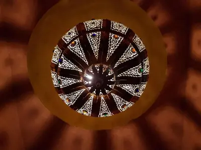 a view of a stained glass ceiling at Riad Al Jawhar in Marrakech