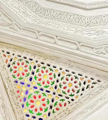 a ceiling in a room with white ceilings at Riad KHOL Bohémia in Marrakech