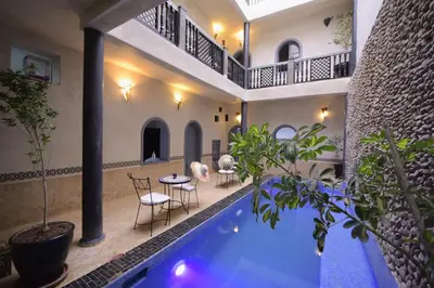 a house with a swimming pool and a living room at 