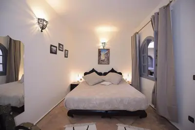 a bedroom with a bed in a room at 