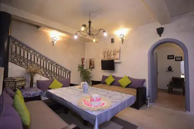 a living room with a table with a cake on it at 