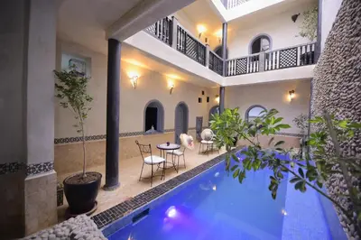 a swimming pool in a building with a house at 