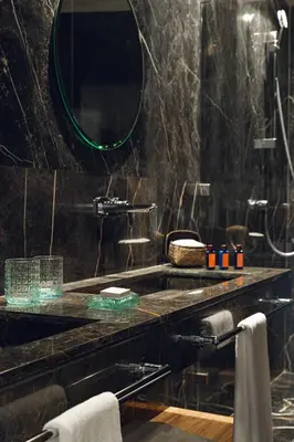 a bathroom with a sink and a mirror at Hotel Jadali & Spa in Marrakech