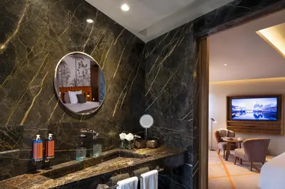 a bathroom with a sink and a mirror at Hotel Jadali & Spa in Marrakech