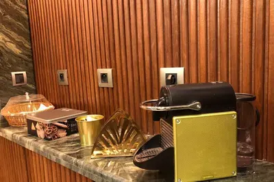 a counter with a toaster and other items on it at Cosy Loft Emeraude Marrakech Prestigia Golf City in Marrakech