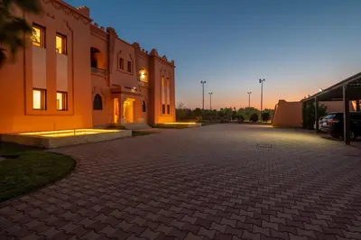 an empty parking lot in front of a building at Villa Dar Laila in Marrakech